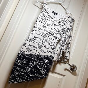 Bebe Addiction asymmetrical dress. Size XXS.